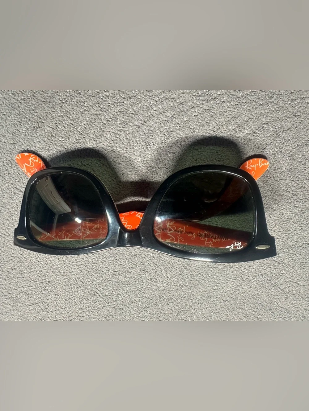 Ray-Ban Black Frame Sunglasses with Red Temples and Green Lenses